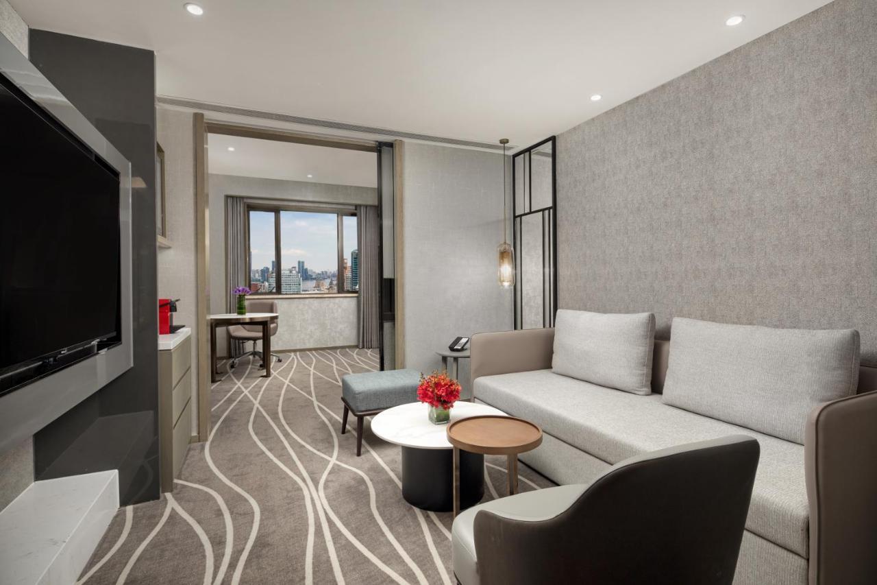 上海南新雅皇冠假日酒店 外观 照片 A suite at the hotel